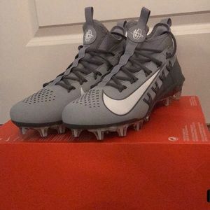 Grey Nike lacrosse cleats
